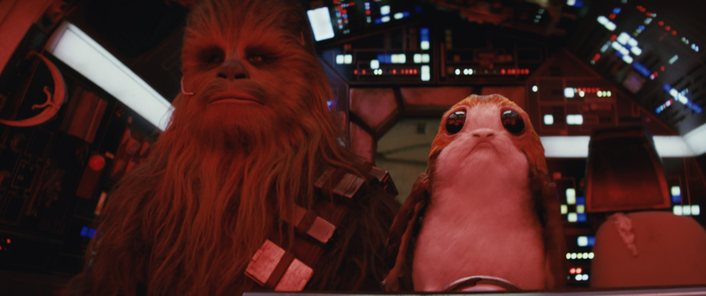 Star Wars: The Last Jedi..L to R: Chewbacca (Joonas Suotamo) and a Porg..Photo: Industrial Light & Magic/Lucasfilm..©2017 Lucasfilm Ltd. All Rights Reserved.