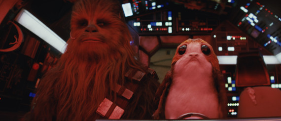 Star Wars: The Last Jedi..L to R: Chewbacca (Joonas Suotamo) and a Porg..Photo: Industrial Light & Magic/Lucasfilm..©2017 Lucasfilm Ltd. All Rights Reserved.